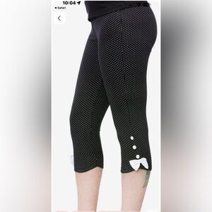 Sourpuss Black Leggings with White Dots and Bow. Elastic waist Size S